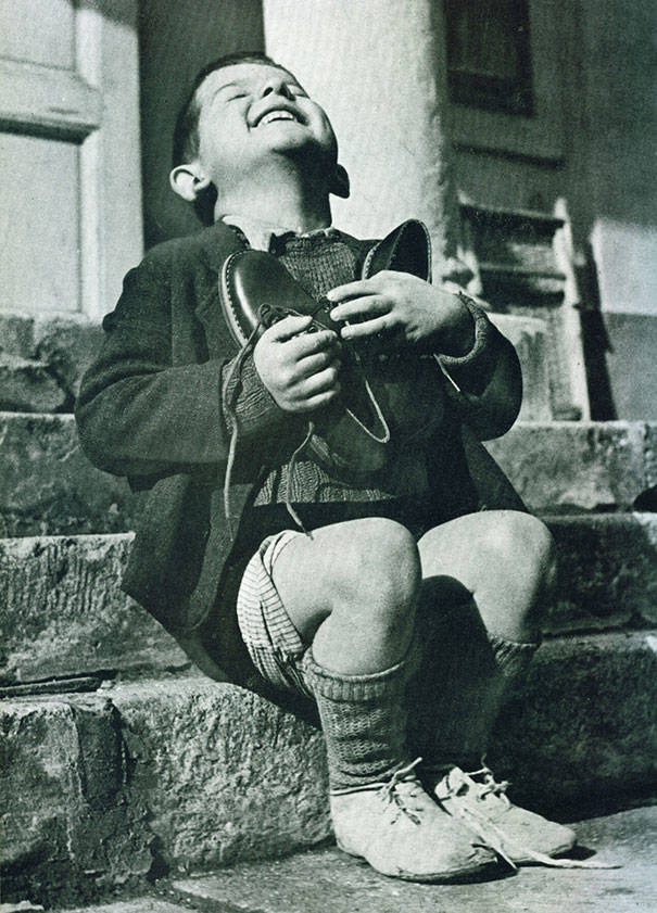 6.) This Austrian boy got a new pair of shoes in World War II.